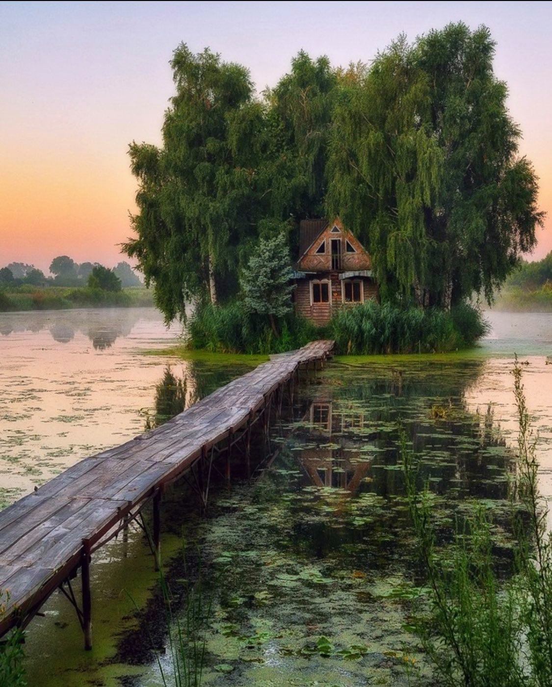 Fairy-tale house in the middle of the lake near Kyiv, Ukraine