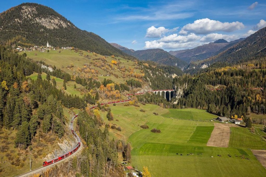 The train spiraled down a switchback of tracks through the mountains.