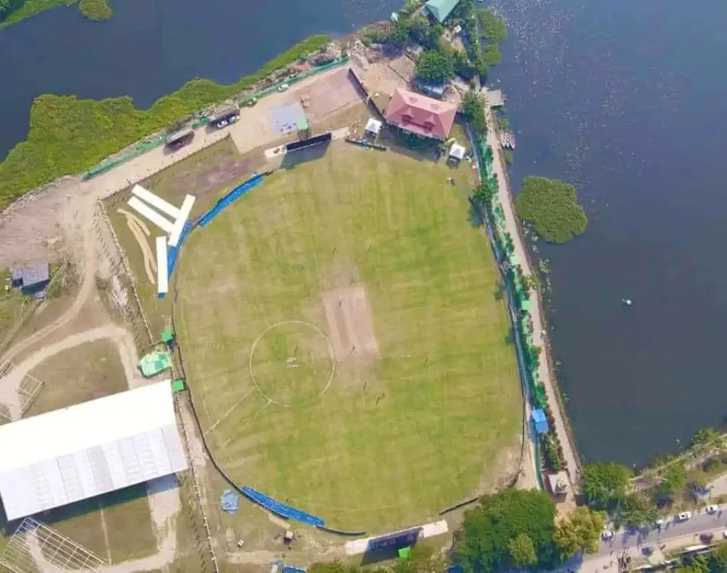 Amingaon Cricket Ground, an idyllic cricket ground flanked by sparkling water bodies, railway tracks and lush-green hills.