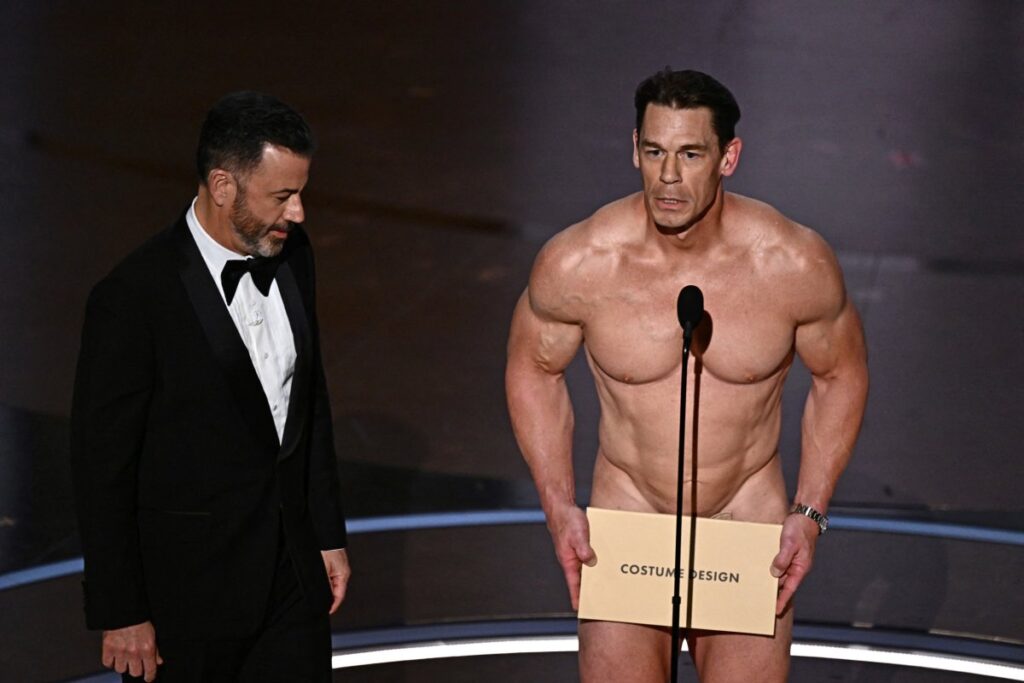 John Cena presents the award for Best Costume Design onstage during the 96th Annual Academy Awards oscars-2024